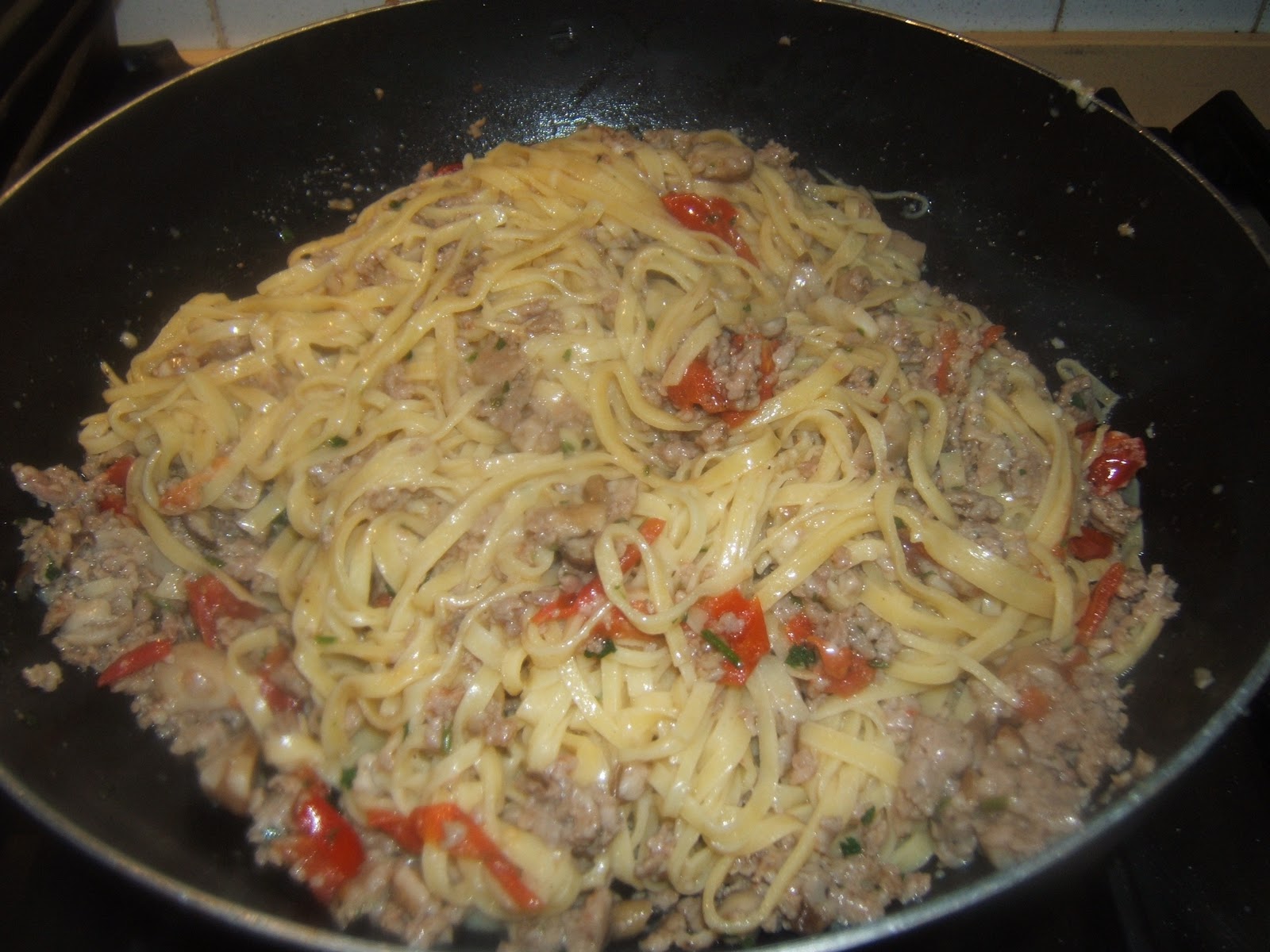 La cucina di Marina Fettuccine con salsiccia e funghi porcini