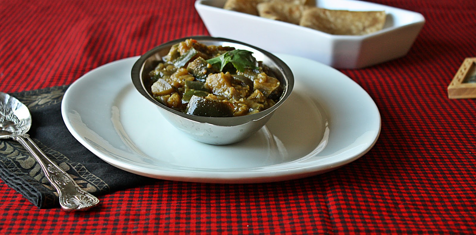 Versatile Vegetarian Kitchen Eggplant curry in spicy coriander sauce