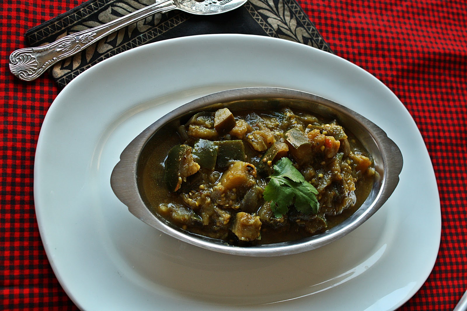 Versatile Vegetarian Kitchen Eggplant curry in spicy coriander sauce