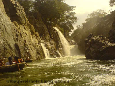 water falls in hogenekkal tamilnadu,india,photograph taken in a tour trip