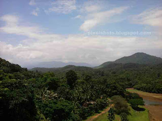 diatant view of western ghats from thenmala lookout tower,kollam,kerala,ottakkal lookout view,western ghat mountains forests