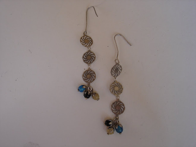 5 boucles d'oreilles 15e