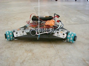 Design and fabrication of holonomic motion robot using DTMF control tones