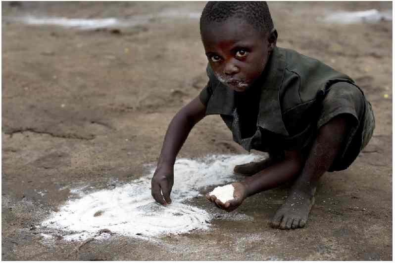 [child+eats+spilled+flour.jpg]