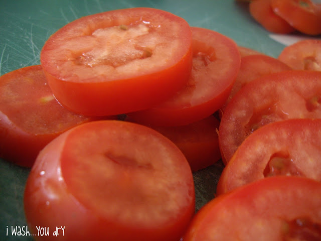 A close up of sliced tomatoes. 