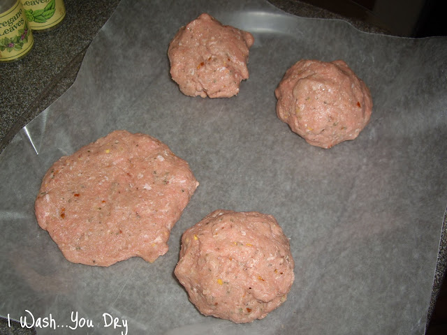 Balls of raw turkey meat ready to be smashed into patties. 