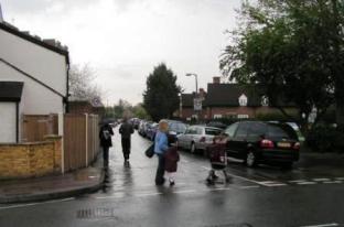 Photo of cars parked right up to the junction