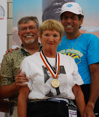 July 2008 Stan & Paula Brady on the Gold Podium with Bill.