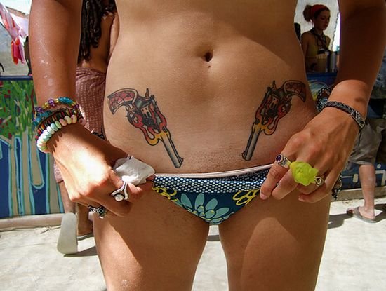 The Bold & the beautiful: Sexy gun tattoos. Sexy gals and tats make stunning