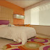 Diseño de dormitorios juvenil en color naranja