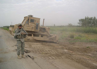  SFC Shaw overwatching the sanitation along RTE Christy west of FOB Kalsu, while the D-7 dozer (operated by SGT Hooper) clears debris and grass.