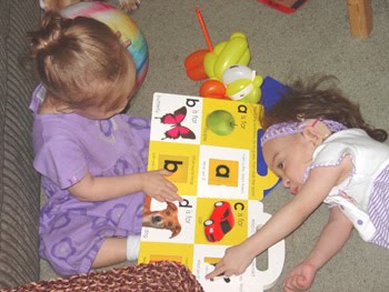 [2006.06.19PlayingTogether.jpg]