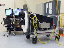 The Lowell Observatory's High-speed Imaging Photometer for Occultation rests on its dolly in the lab prior to installation on the SOFIA airborne observatory