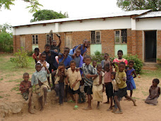 Orphans posing outside the reading room classroom