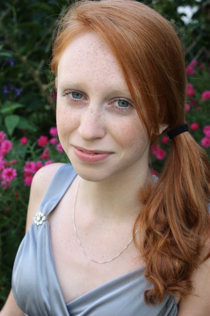 with braces Redhead