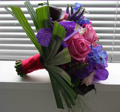 Gemma 39s wedding bouquet includes Vivid Purple Vanda Orchids 