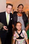 Cameron with wife and daughter...