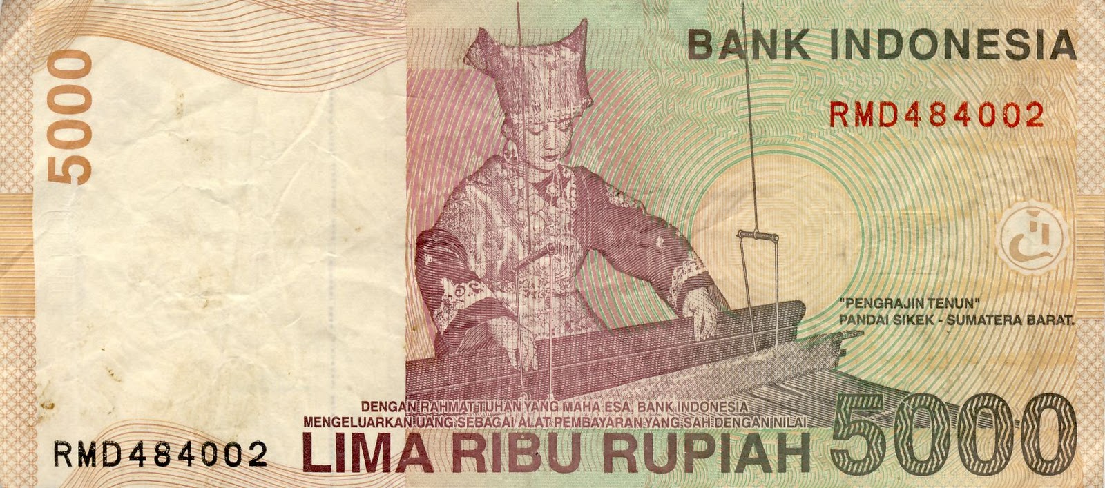 Membedakan uang asli dan palsu