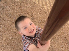 Easton wanted a picture on the pole too!