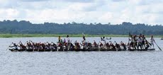 [Oarsmen+row+their+boat+during+the+annual+boat+race+festival+in+the+waters+of+Rudrasagar+Lake_22092009.jpg]