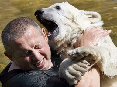 [man+with+polar+bear.jpg]