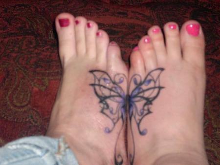 pretty butterfly tattoos. pretty foot tattoos.