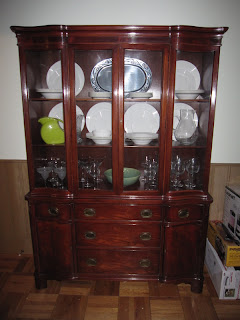 China Cabinet Organized with White Dishes