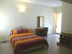 Master bedroom with ensuite bathroom and private balcony