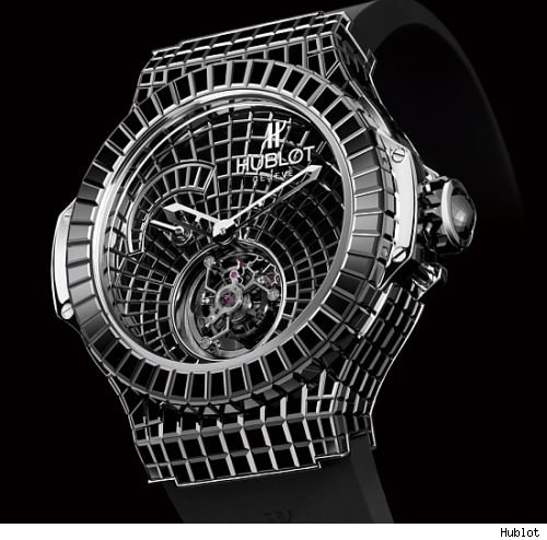 Hublot made the million dollar big bang watch out of white gold and rare baguette cut black diamonds. almost 550 diamonds are all over the watch,