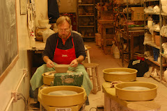 The pottery carver at his wheel