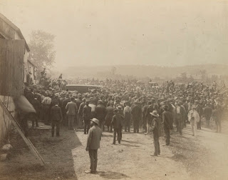 An outside photograph of a large crowd.