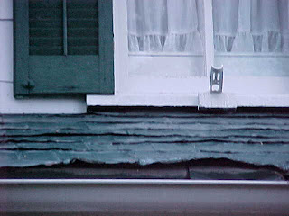 Green tin shingle roof that is leaking