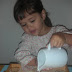 The Importance of Pouring Water: Montessori Preschool Practical Life Activities