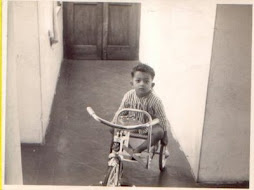On my Tricycle in "Mehrle Devji Bldg" in Mombasa(Early 1960's)