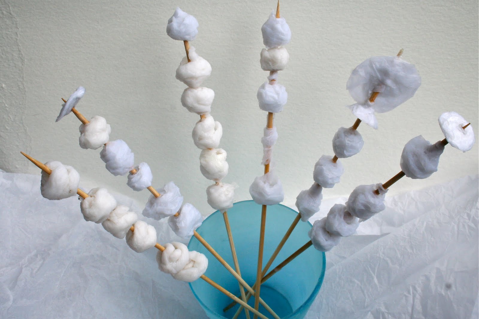 Hilary Bravo Making plain white papiermâché beads ready for decorating.