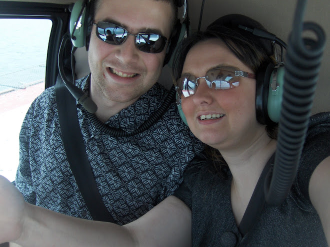 Scott and Laura in a helicopter