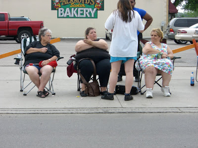fat women watching the parade
