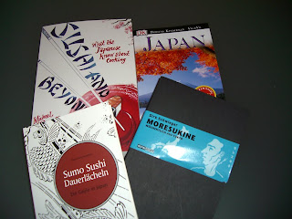 reading up on Japan (onemorehandbag)