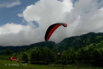 Solang valley is in Himachal Pradesh, India and is known for its summer and winter sports. The sports most commonly offered are parachuting, paragliding, skating and zorbing. Giant slopes of lawn comprise Solang Valley and provide it its reputation as a popular ski resort. A few ski agencies offering courses and equipment reside here and operate only during winters.Snow melts during the summer months and skiing is then replaced by zorbing (a giant ball with room for 2 people which is rolled down a 200 meter hill), paragliding, parachuting and horse riding. 13 kms. is a splendid valley between Solang village and Beas Kund. Solang valley offers the view of glaciers and snow capped mountains and peaks. It has fine ski slopes. The Mountaineering Institute has installed a ski lift for training purpose. Located here is a hut and guest house of the Mountaineering and Allied sports Institute, Manali. Now a few hotels have also come up. The winter skiing festival is organised here. Training in skiing is imparted at this place. Posted by Ripple (VJ) : ripple, Vijay Kumar Sharma, ripple4photography, Frozen Moments, photographs, Photography, ripple (VJ), VJ, Ripple (VJ) Photography, Capture Present for Future, Freeze Present for Future, ripple (VJ) Photographs , VJ Photographs, Ripple (VJ) Photography : 