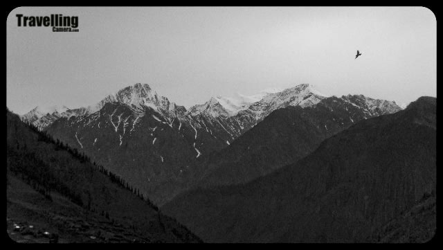 Travelling Camera on back journey from Famous Shiva Temple @ Trilokinath, Lahaul and Spiti, Himchal Pradesh...This blog PHOTO JOURNEY was started on first July of 2008 and very first post was about Lahaul and Spiti... Here I am going to share some of the photographs of back journey from Trilokinath which is in Lahul district of Himachal Pradesh...Photographs licked near Tandi Bridge... As you can see in above photographs.. Tandi-0 km :)Tandi is a place in Lahaul and Spiti District of Himachal Pradesh, where Chandra River and Bhaga river meets to make Chandrabhaga....The Chandrabhaga River is also known as Chenab which is formed by the confluence of the Chandra and Bhaga rivers at upper Himalyas. It flows through the Jammu region of Jammu and Kashmir into the plains of the Punjab, forming the boundary between the Rechna and Jech interfluves. It is joined by the Jhelum River at Trimmu and then by the Ravi River Ahmedpur Sial. It then merges with the Sutlej River near Uch Sharif, Pakistan to form the Panjnad or the 'Five Rivers', the fifth being the Beas River which joins the Satluj near Ferozepur, India. For more info CLICK HEREFrom this journey, I am not able to recall any moment when snow covered Himalyas were not visible from our car.. They were everywhere... I think Lahaul and Spiti district is amazing place to chill out.. but it has another side to it.. While we were at Trilokinath, we spent some time with Pandit ji there and we got to know that most the areas disconnects from rest of the world for 7 months in an year... Can you imagine yourself living in an area for 7 months without any access to vehicles n all... Its really tough but they have planned their life according to their local eco-system...While travelling in Lahaul and Spiti, we can see beautiful valleys along with snow capped hills of Himalyan Range... This region is rich in terms of Agriculture... I am not sure about the whole district but area between Manali and Keylong had lot many valleys with agricultural land...Towards north of the state is a snow capped Trans Himalayan district of Himachal Pradesh comprising of two major valleys Lahaul and Spiti. The district is lying on the Hindustan-Tibet border... It is a tribal district with unique Tibetan Buddhist culture...