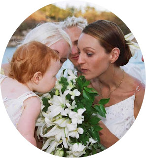 Flower girl smelling the wedding Bouquet Townsville Celebrant, Magnetic island Celebrant