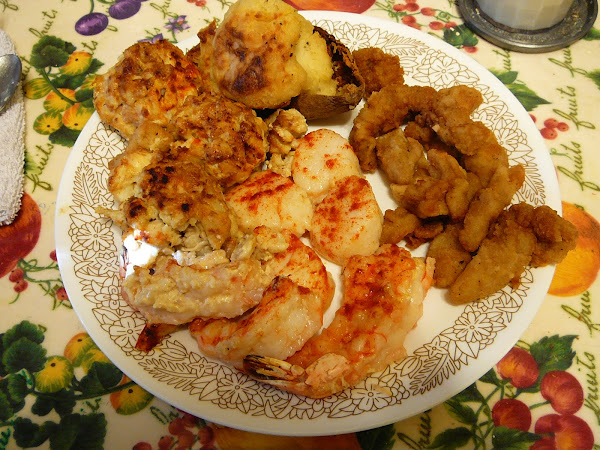 Jumbo Lump seafood platter with stuffed potato