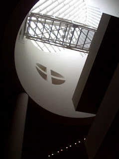 view up into the lightwell of SFMoMA, phone photograph by A.E. Graves