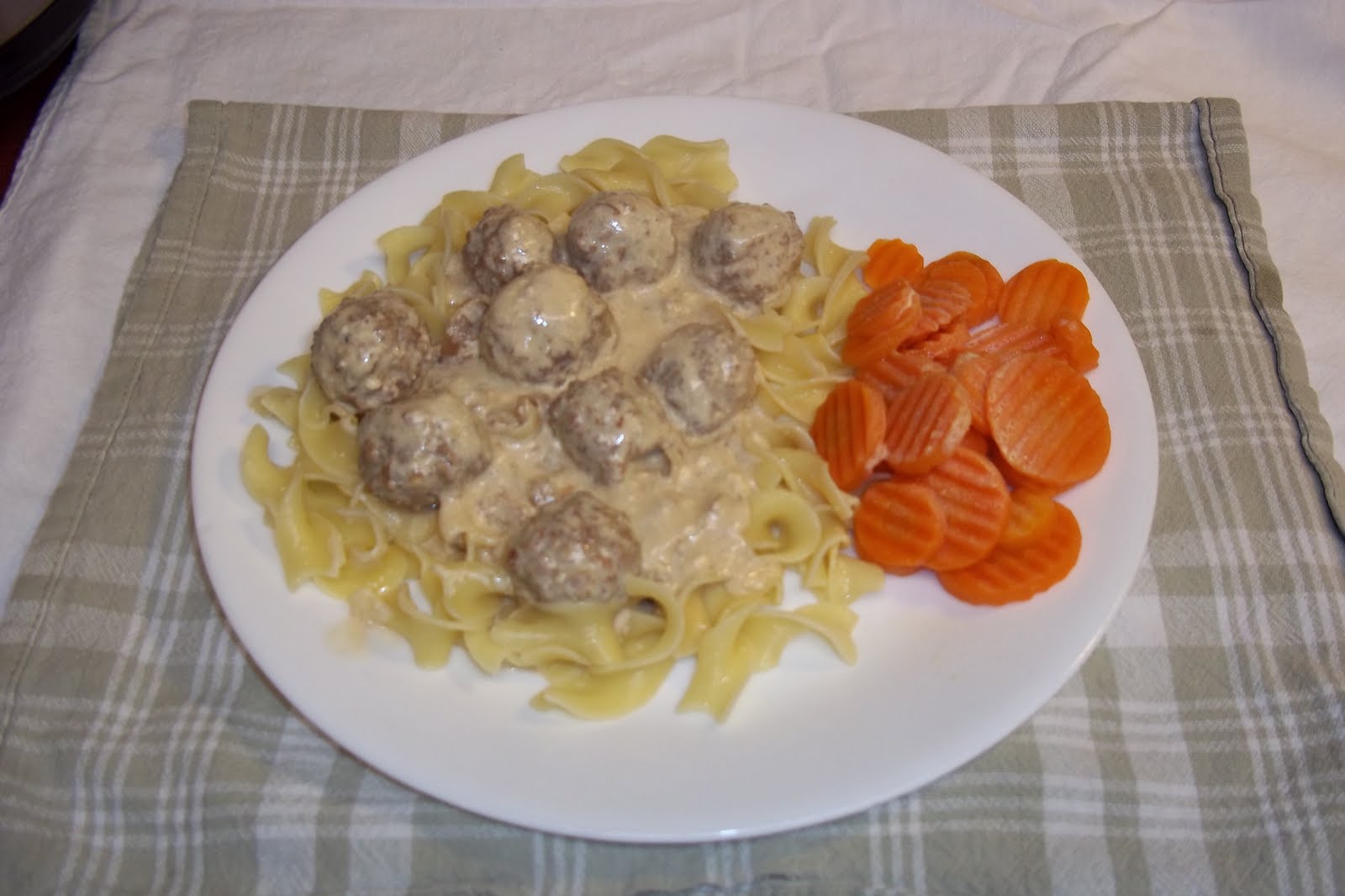 The Daily Smash Meatballs over Buttered Noodles