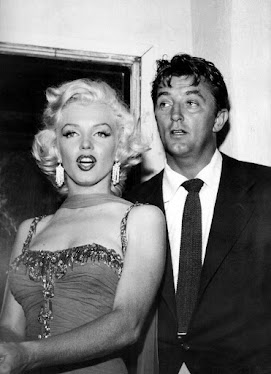 Robert Mitchum y Marilyn Monroe