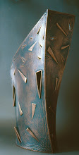 Vessel (sculpted from wax with fabricated triangles pushed through wax)