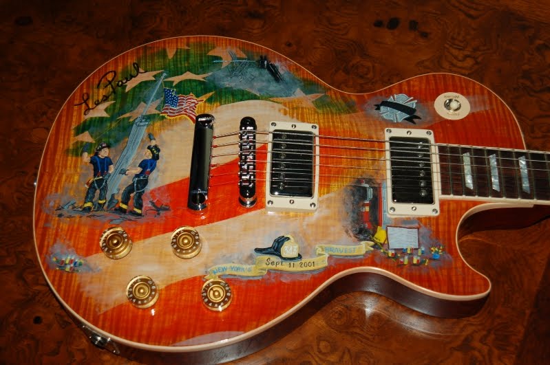 911-guitar-les-paul-owned.jpg