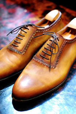 Shoes being re-patinated at Berluti – Permanent Style