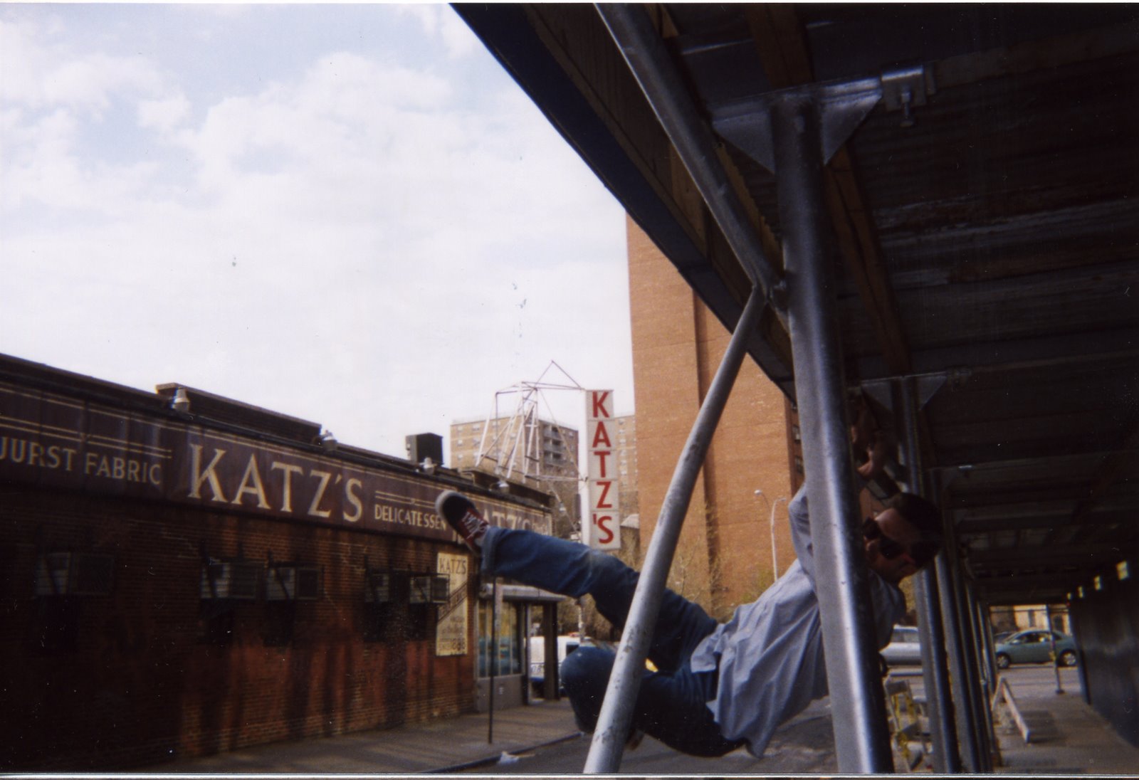 [swing+on+scaffolding+in+front+of+Katz's.jpg]