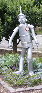 Sculpture of the Tin Man in vegetable garden at Toledo Botanical Garden